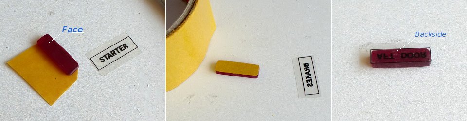 Transparent label glued to the back side of plexiglass by two-sided duct tape